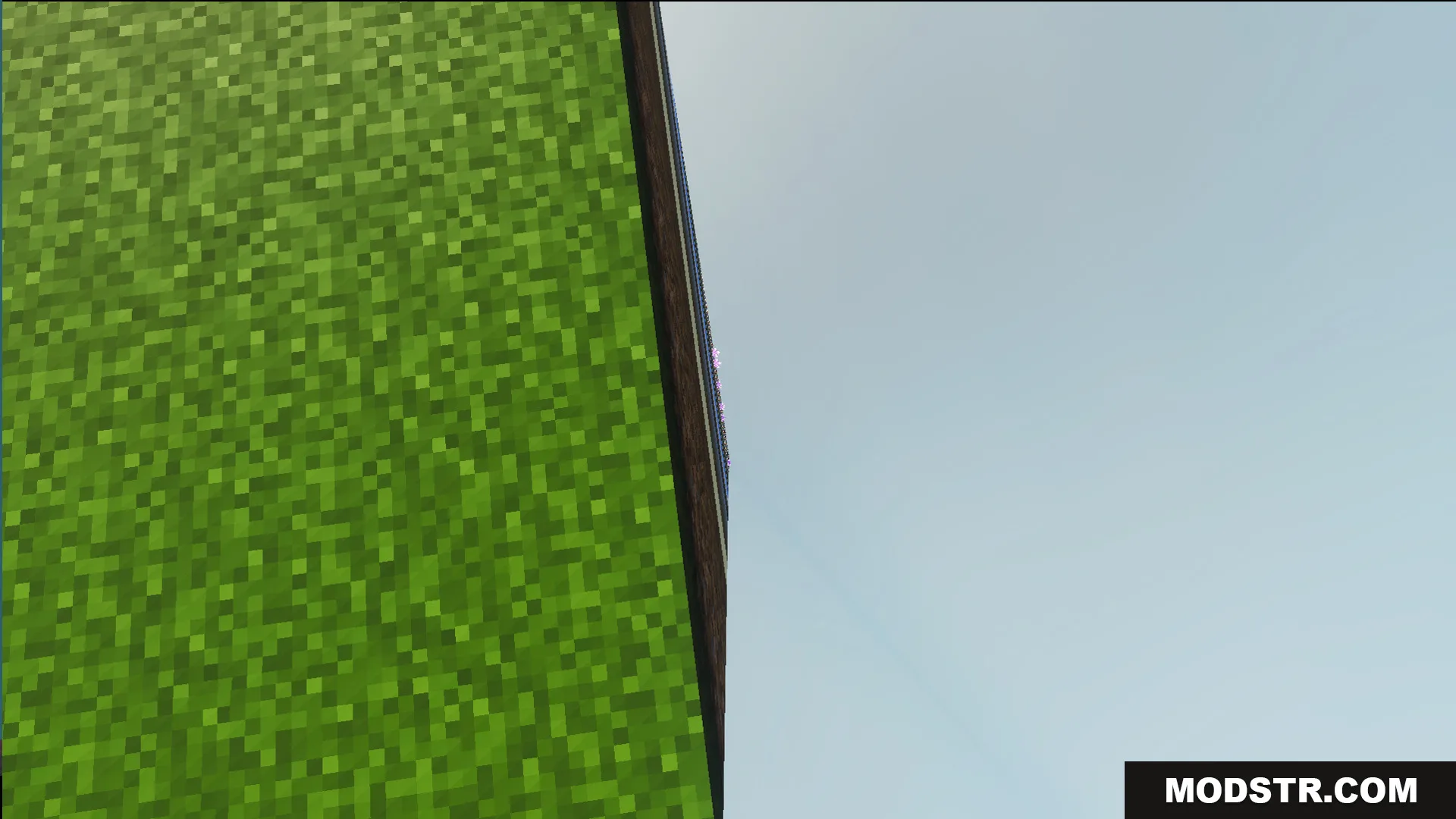 Looking down the side of a deep vertical survival pit
