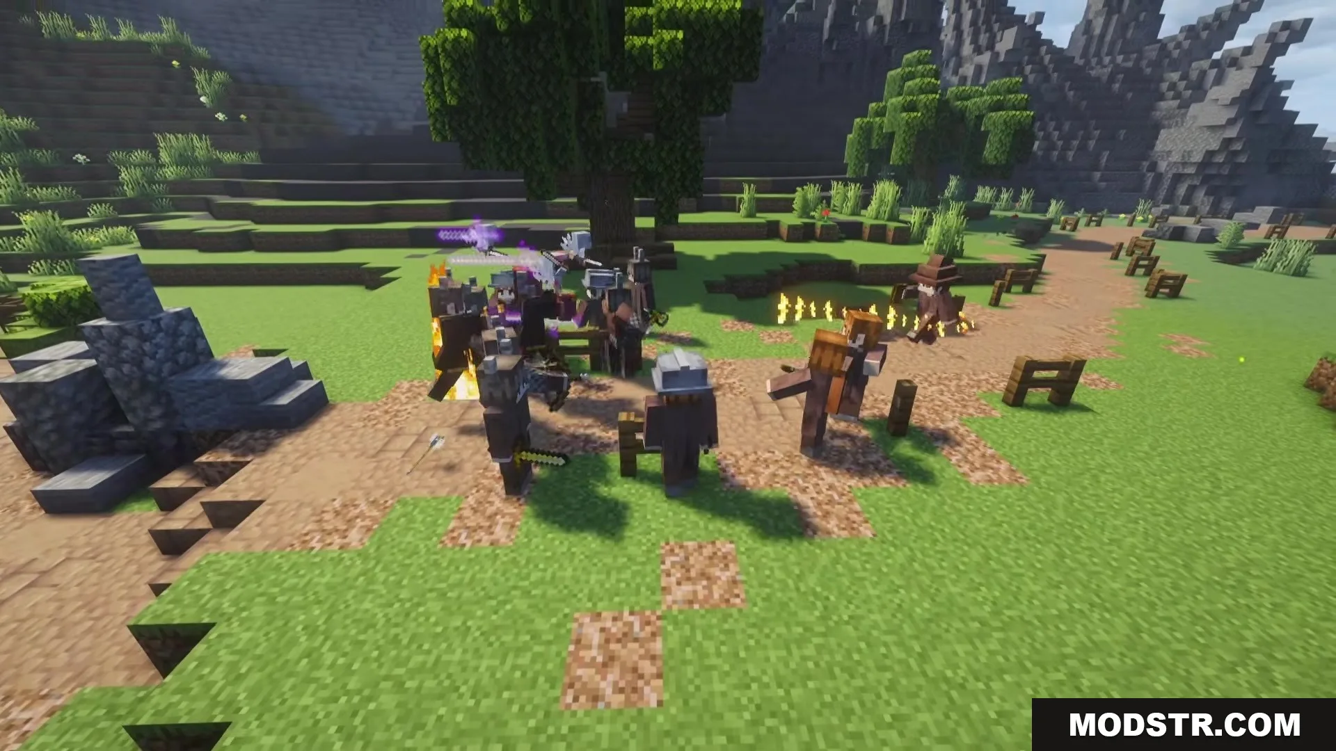Human allies and mages battle demons near a tree and stone ruins