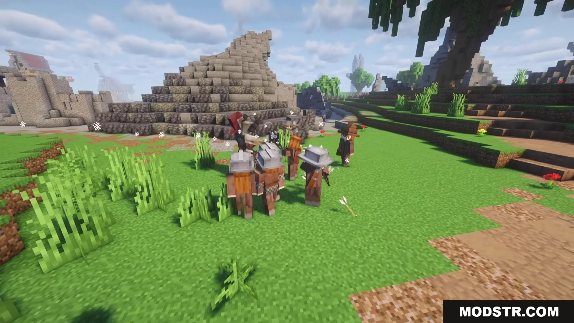 Recruited human warriors and archers gather together in a grassy biome
