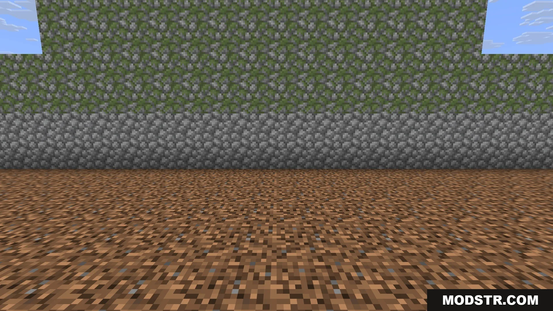 Ancient Artifacts 2 Data Pack Screenshot 1 A wall made of cobblestone and mossy cobblestone blocks on dirt ground