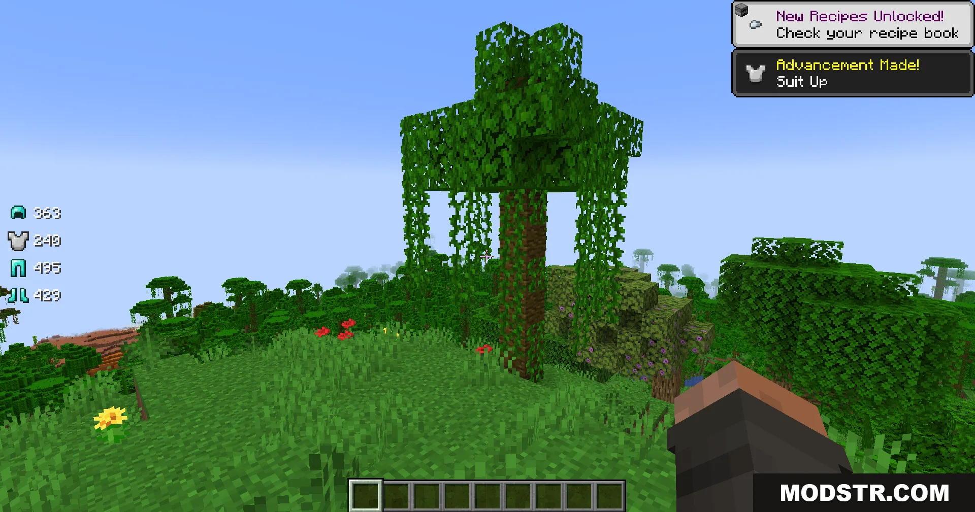 Armor Status Mod Screenshot 2 Player exploring a jungle with armor durability icons displayed on the screen