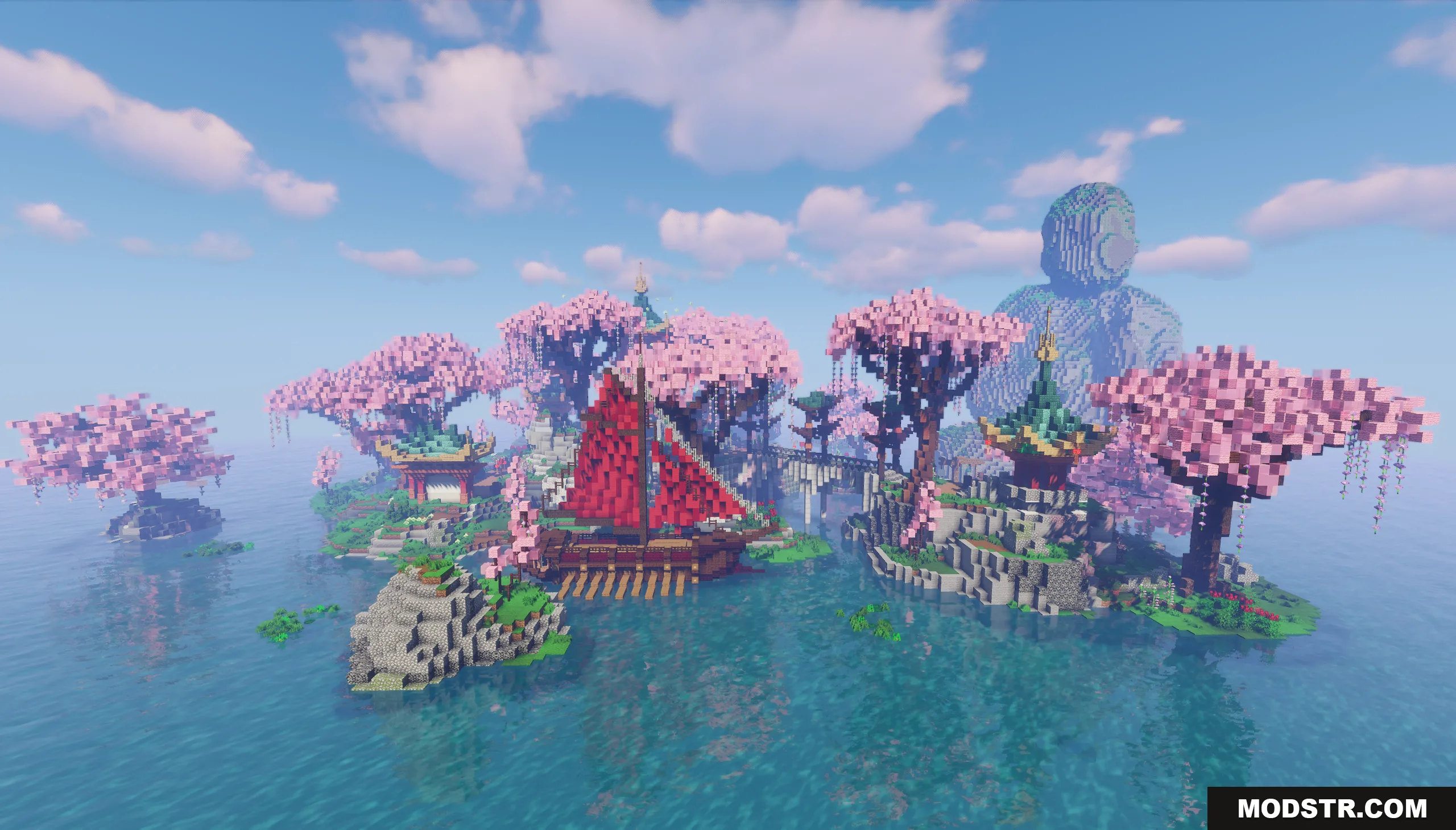 A scenic Minecraft island featuring pink cherry blossom trees and a red ship