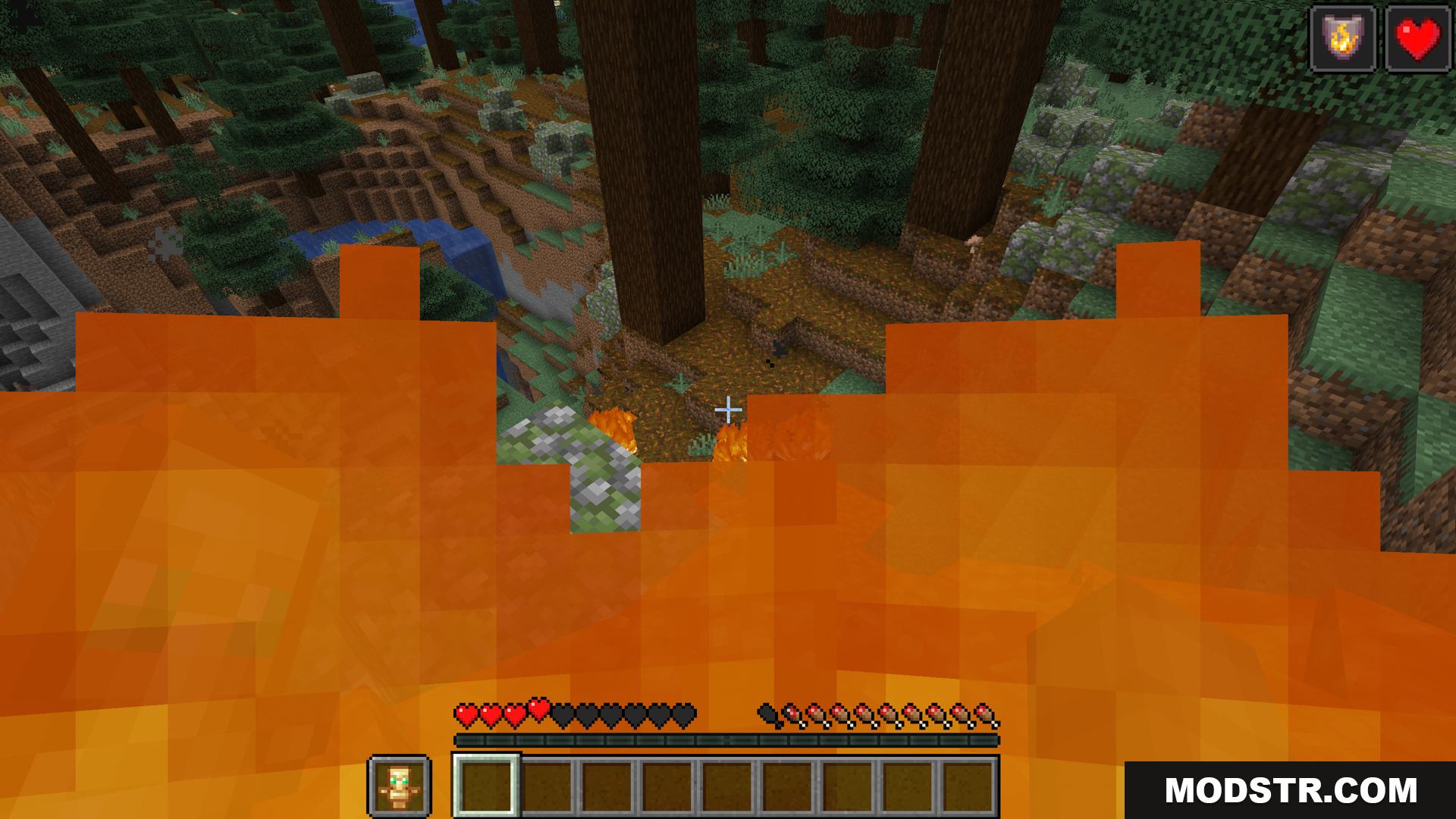 Player on fire with low health holding a totem
