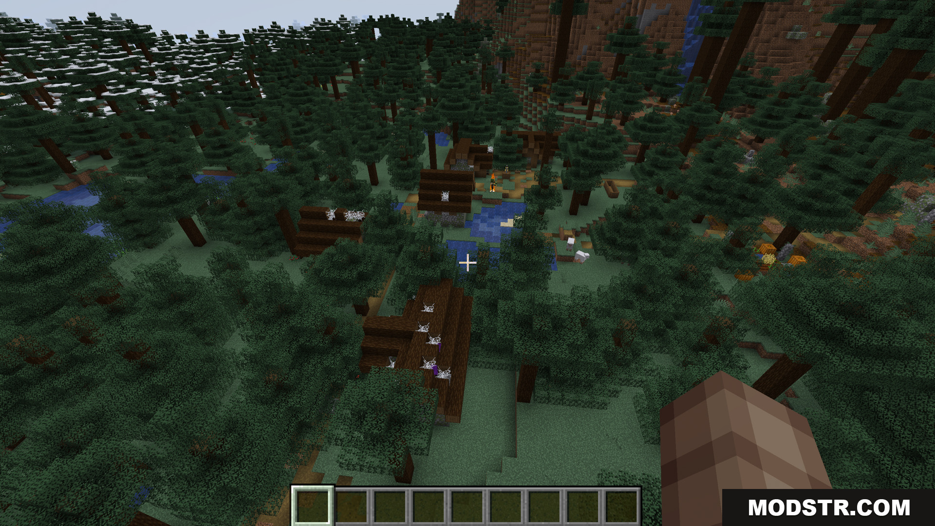 Player falling from high above a taiga village in survival