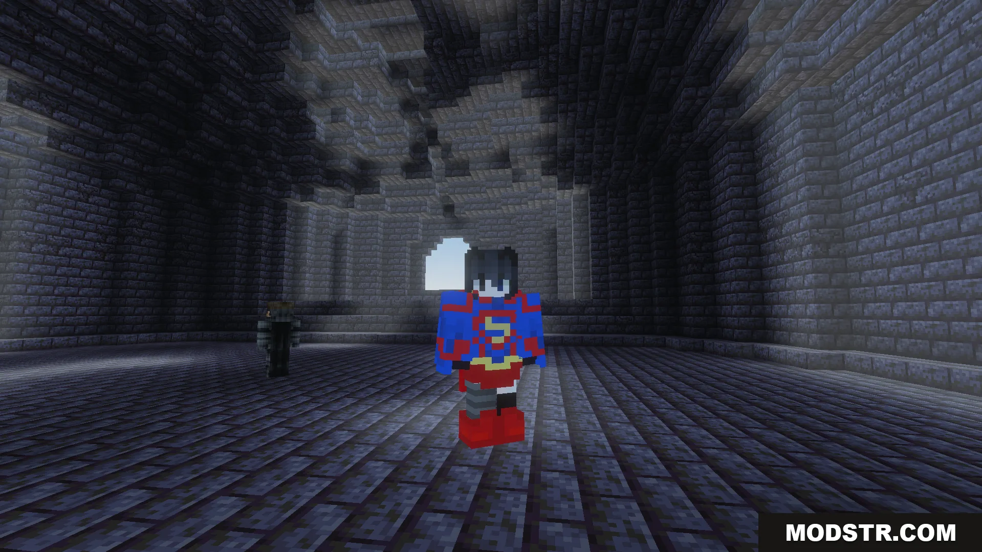 Player wearing Avras Heroes Superman suit standing inside a large stone brick room
