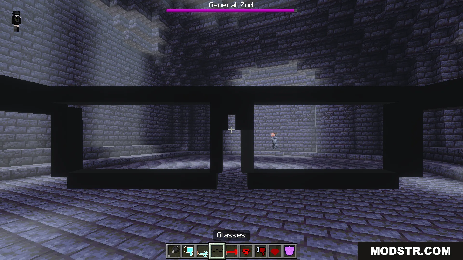 Player wearing glasses while facing the General Zod boss in a stone room