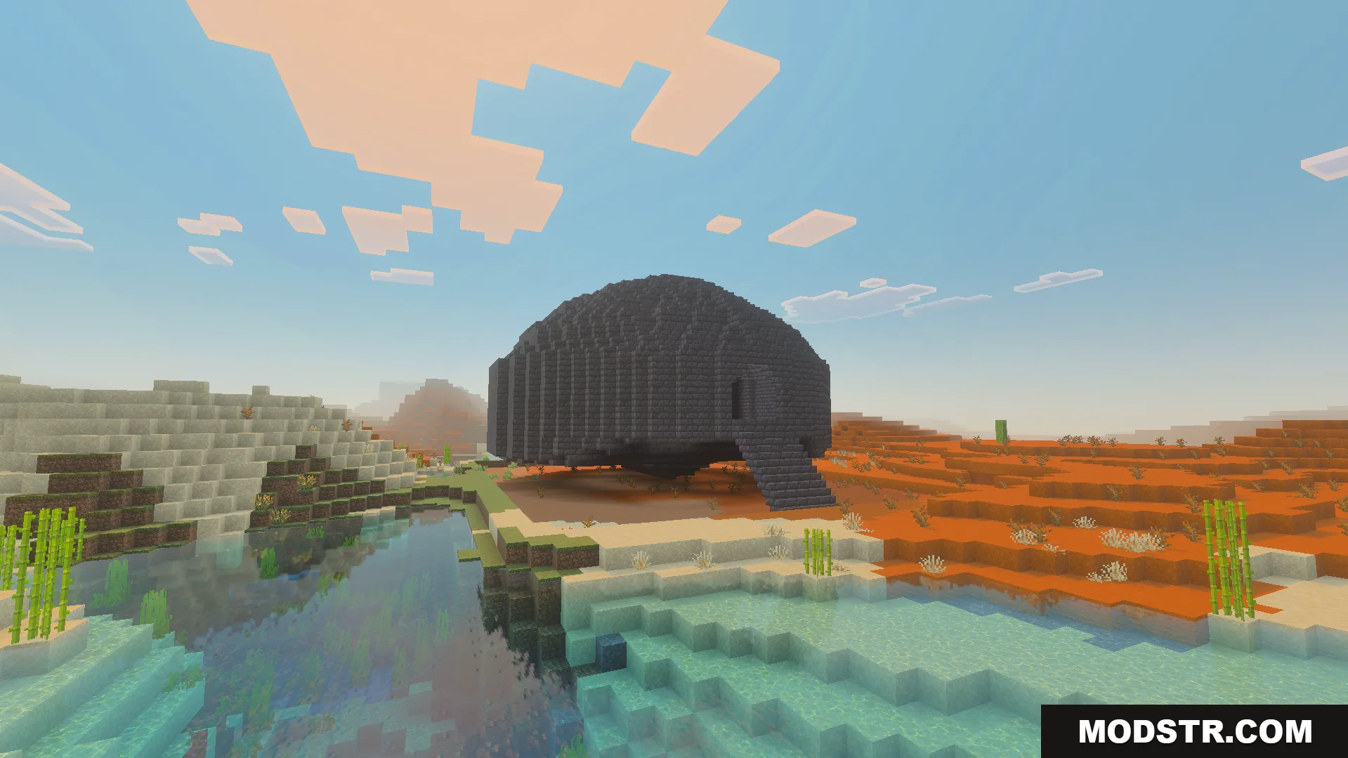 A large dark grey crashed pod structure located in a desert biome