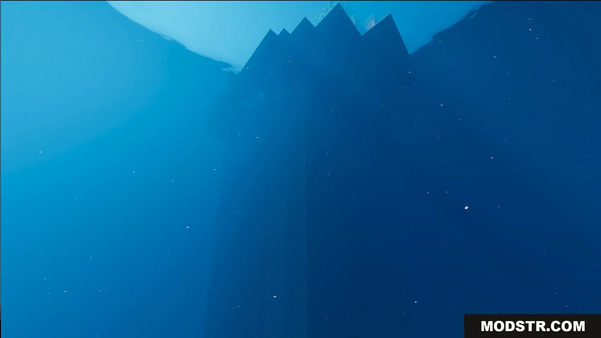 A dark underwater view of a large structure beneath the deep ocean surface