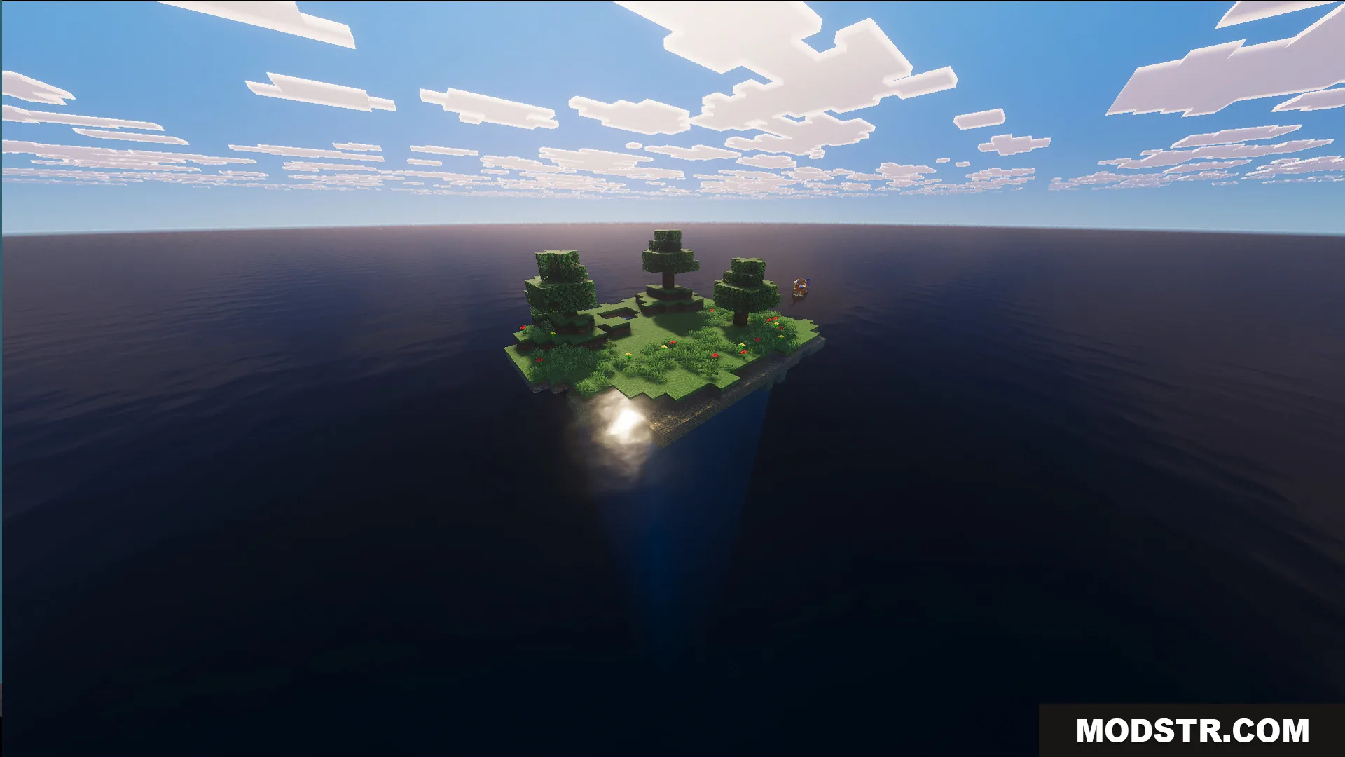 Aerial view of a tiny island in the middle of the ocean
