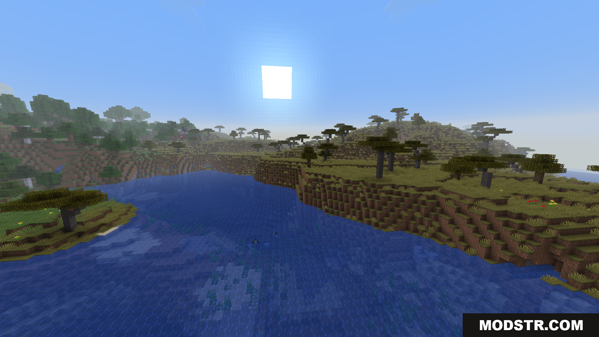 BCLib Neoforge Mod Screenshot 3 Savanna biome meeting grassy hills near a river and ruined portal