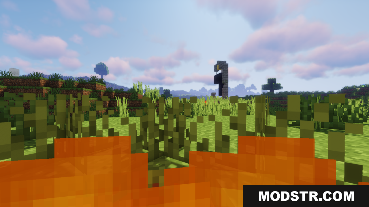 Better Lower Fire Texture Pack Resource Pack Screenshot 3 Viewing a ruined portal through tall grass with low screen fire