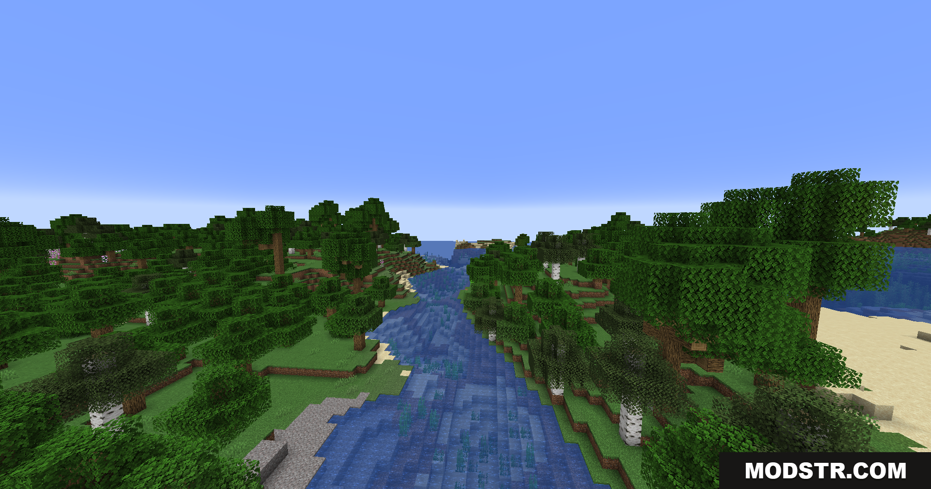 Better Render Distance Mod Screenshot 4 A wide river flowing through a dense forest to the ocean