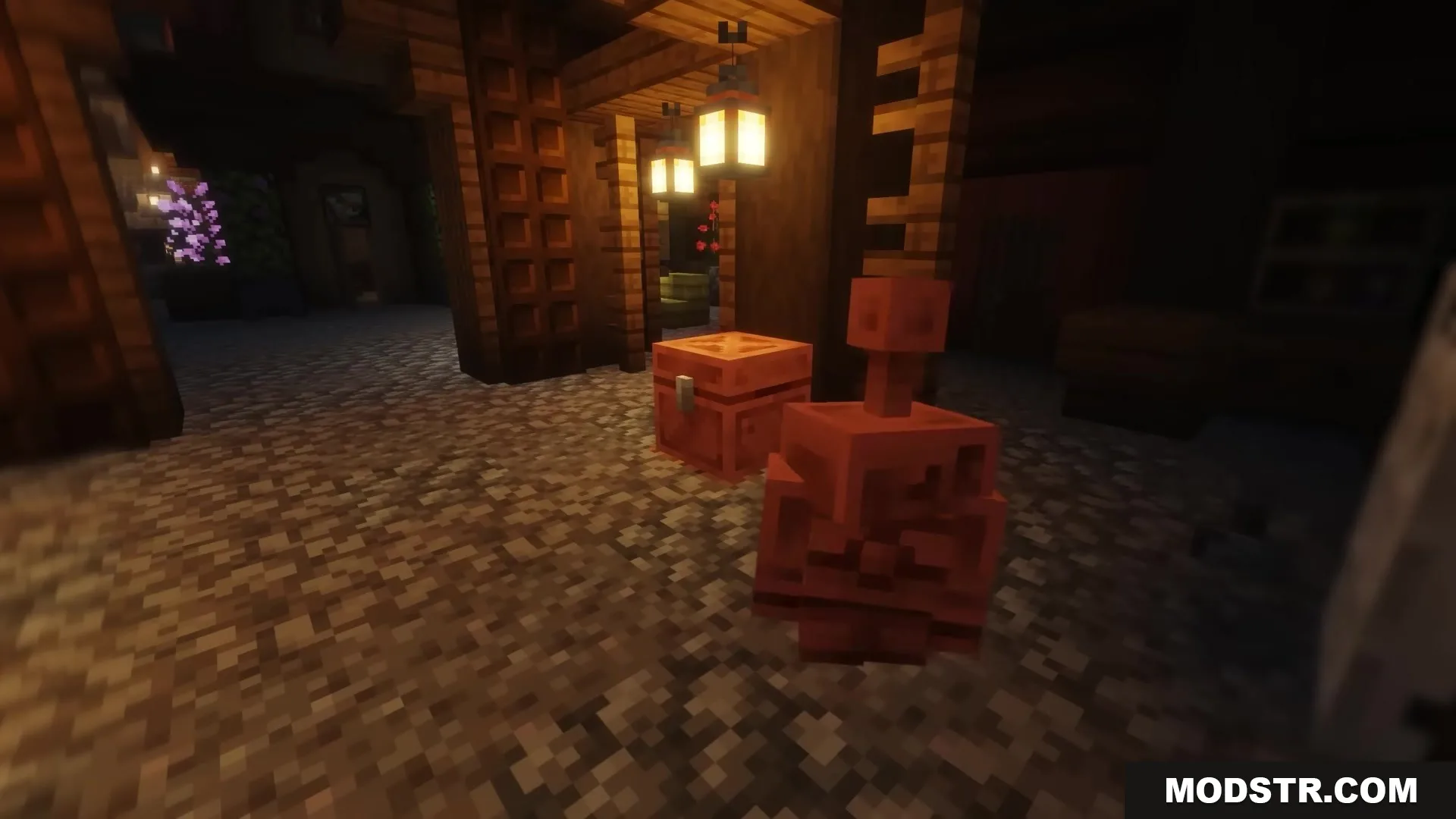 Bettercoppergolem Mod Screenshot 3 A small copper golem stands beside a copper chest under hanging lanterns