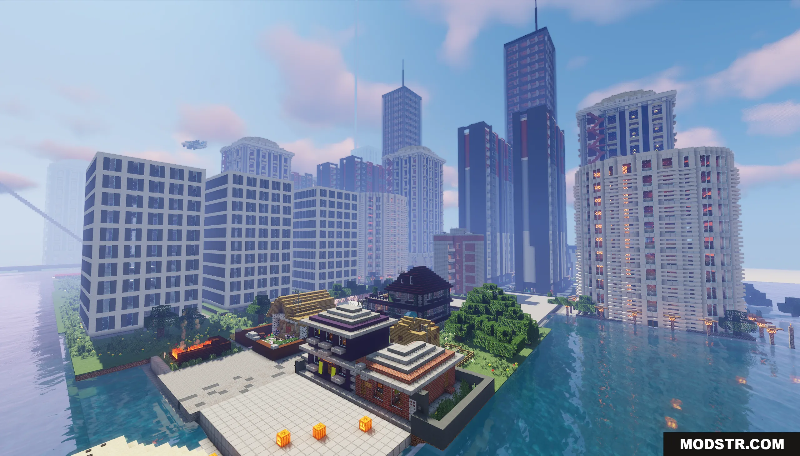 Big City of New Nordland Map Screenshot 5 Tall glass skyscrapers and small houses overlooking a calm river in the city