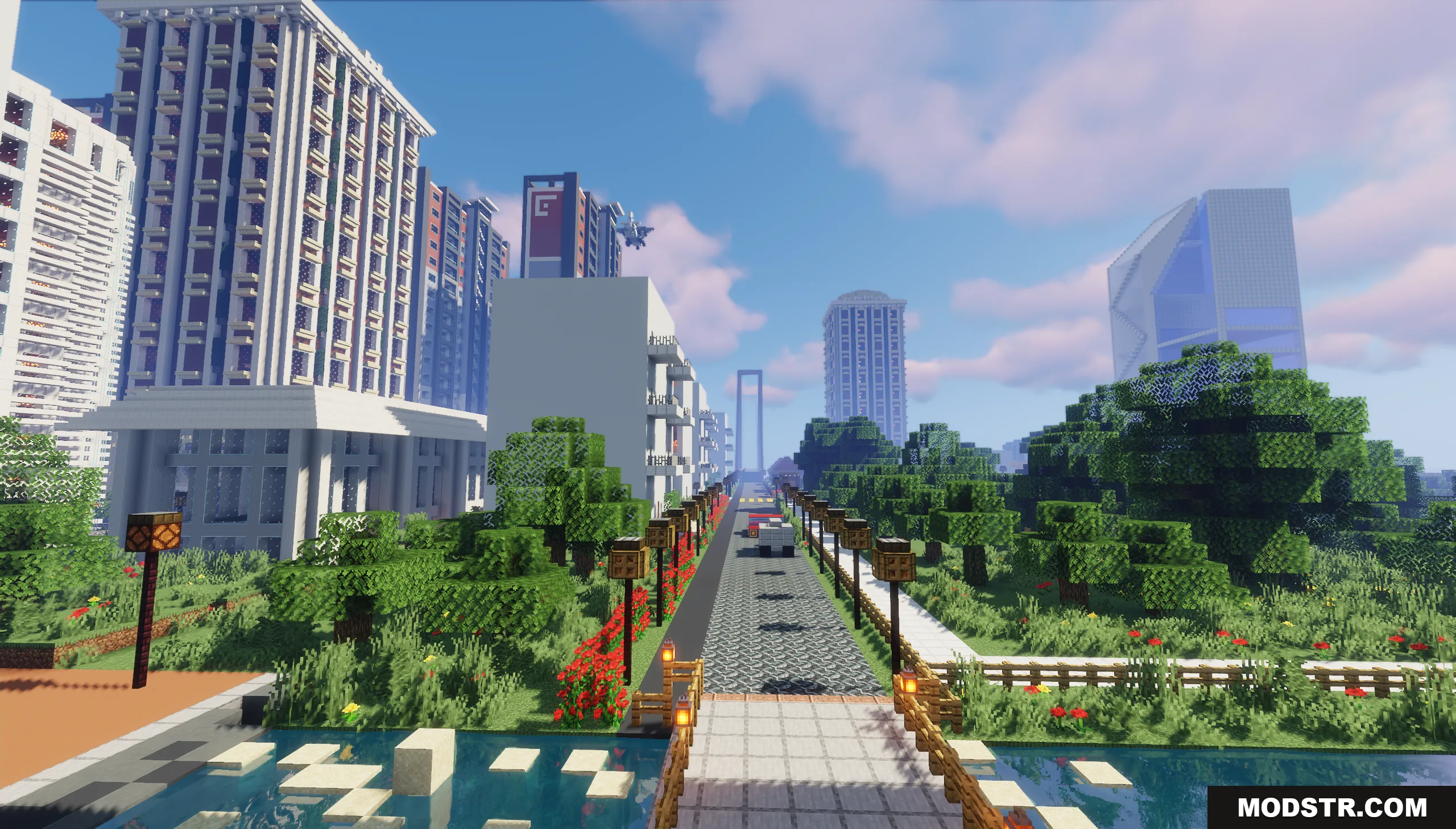 Big City of New Nordland Map Screenshot 10 A scenic street view with lush greenery and tall buildings in Minecraft