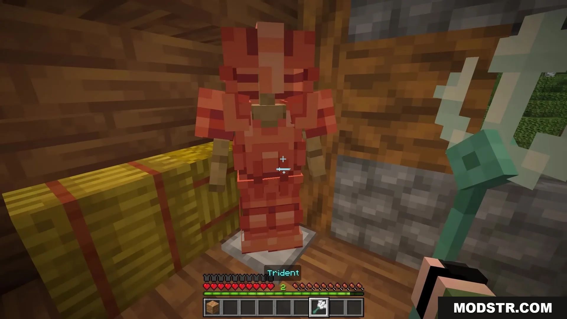 Bits and Balance Mod Screenshot 11 Minecraft player holding a trident next to red armor on an armor stand