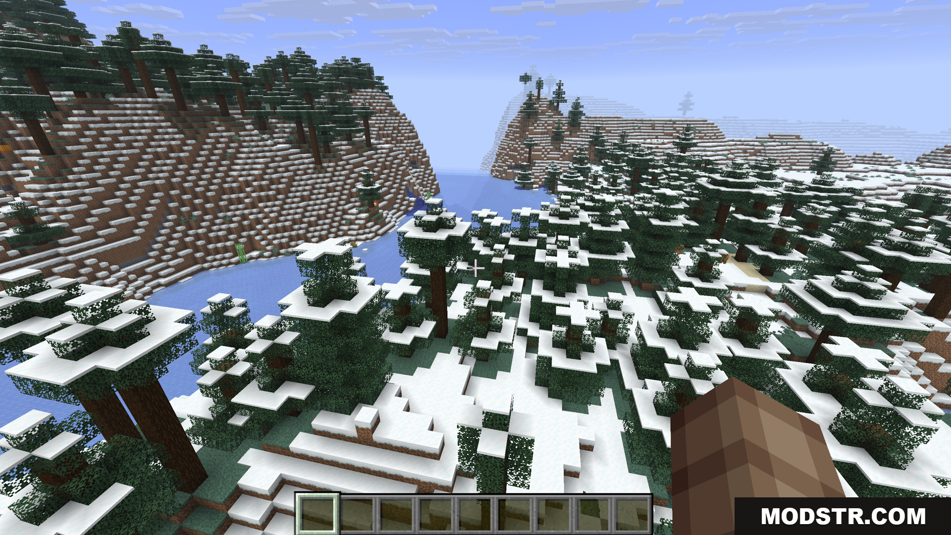 A snowy taiga biome with snow covered trees and hills
