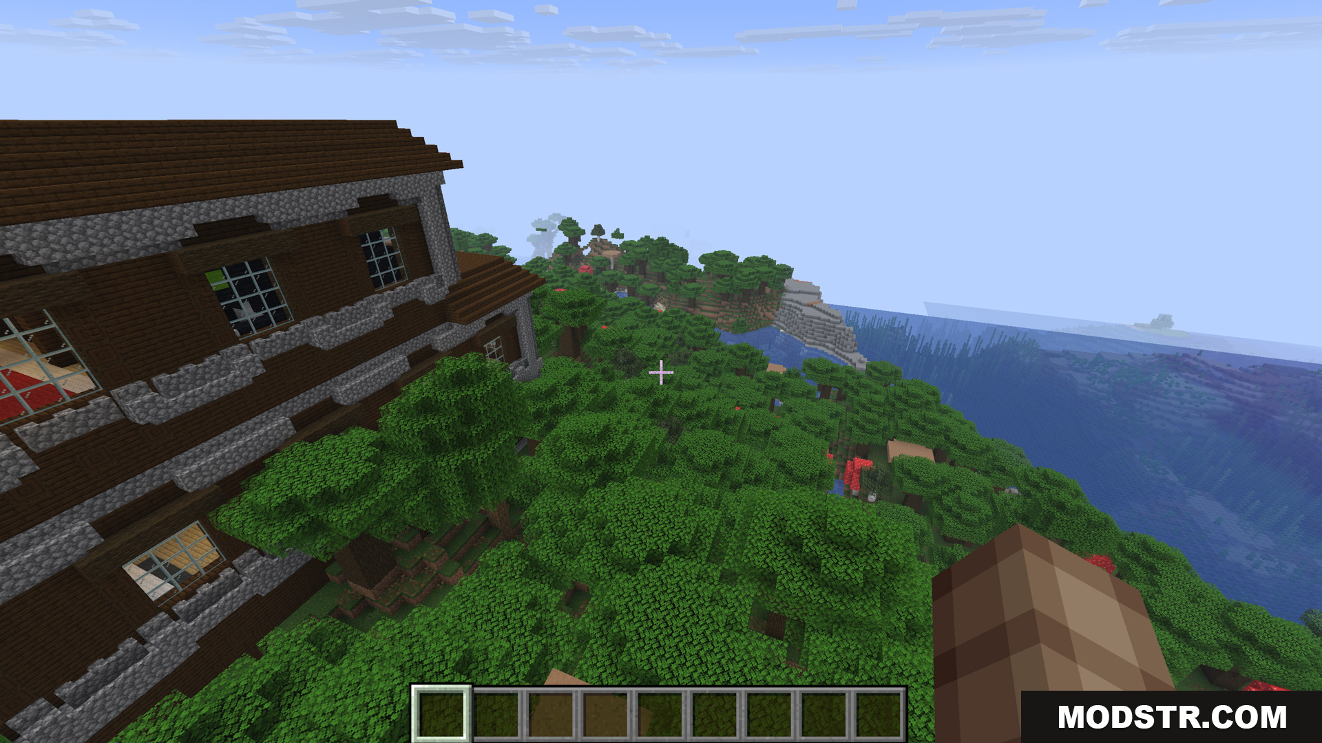 View of a woodland mansion structure located near an ocean biome