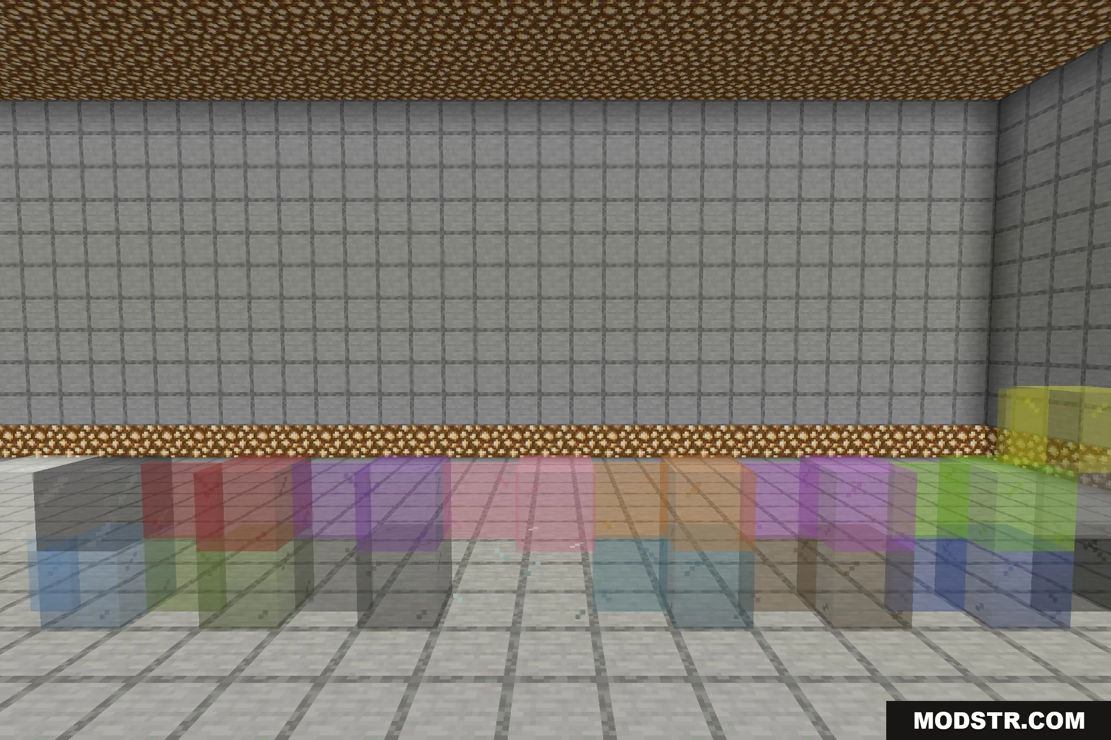 BorderlessGlass Resource Pack Screenshot 1 A row of colored stained glass blocks without borders in a stone room