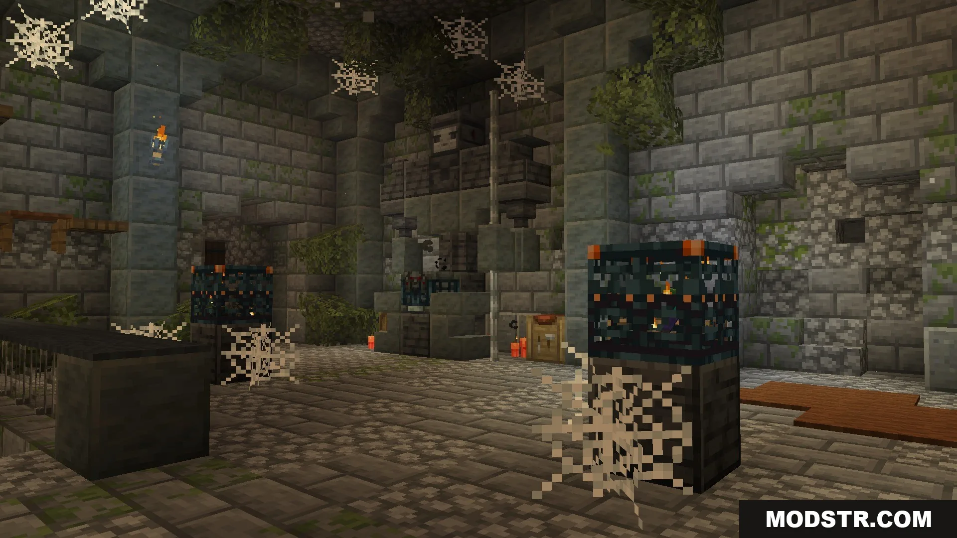 Citadel of Trials Data Pack Screenshot 5 A large stone stronghold chamber featuring trial spawners and hanging cobwebs