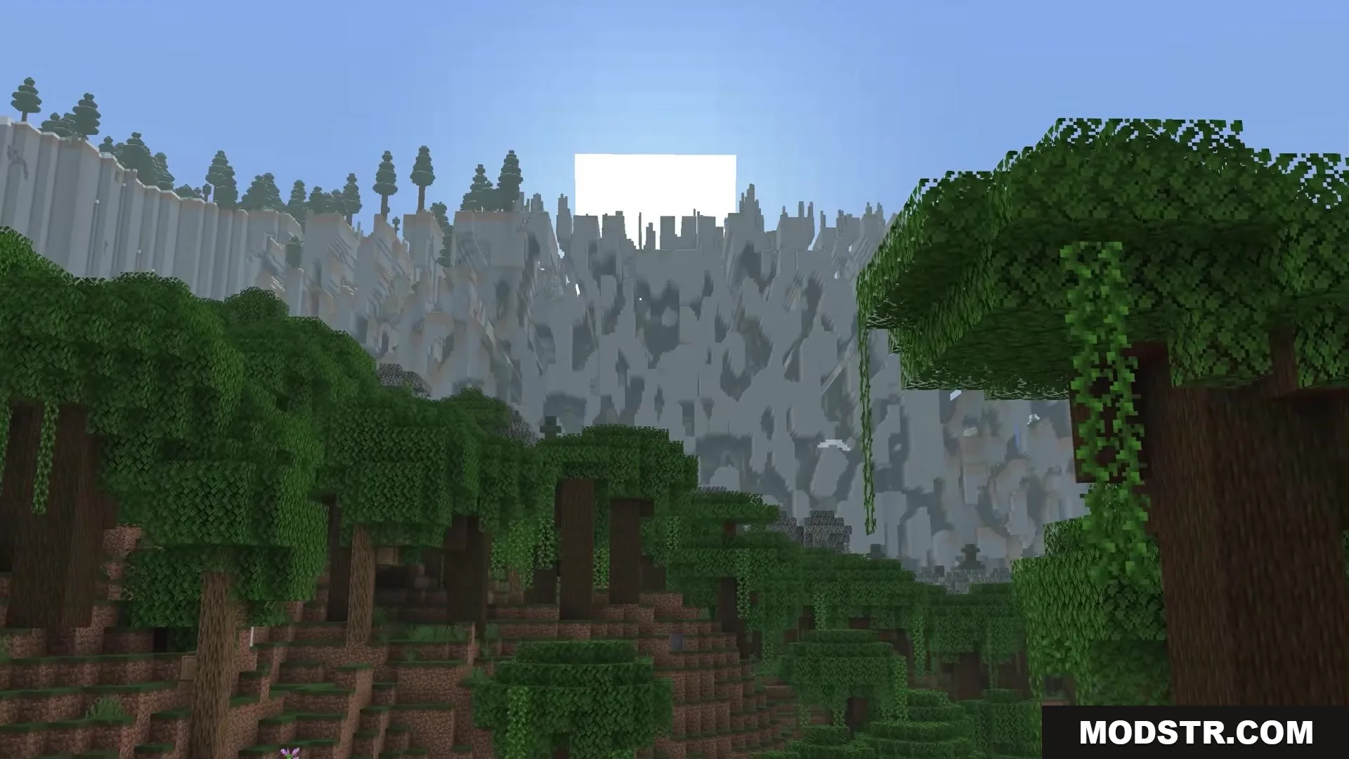 Dense jungle trees overlook a massive wall of broken terrain blocks