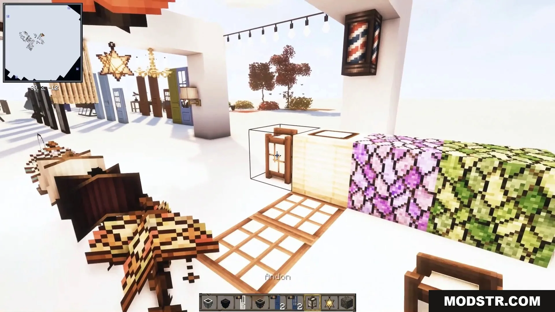 Cozy paper lanterns, string lights, and colorful patterned blocks create a warm atmosphere.