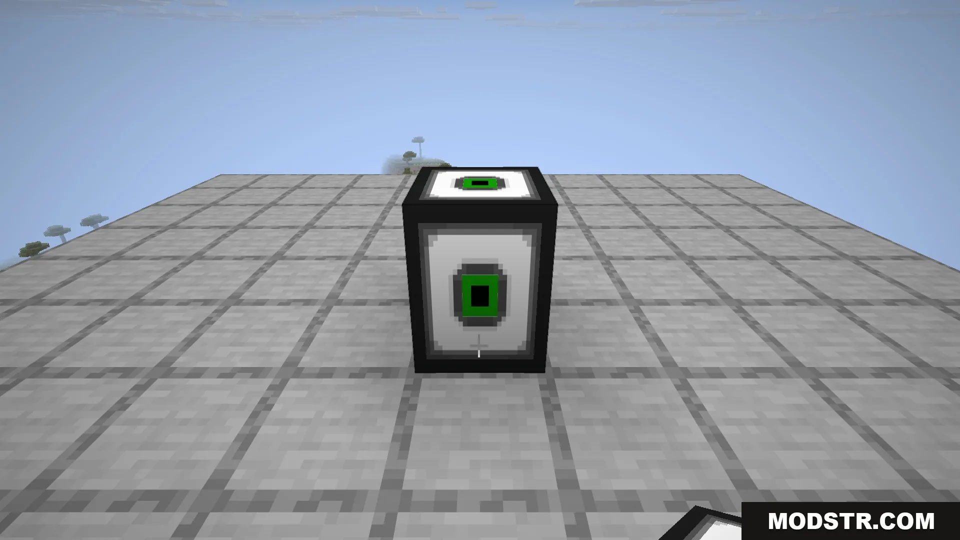 A Compact Machine block placed in the world - its black-and-white casing with a green core is the entrance to a whole room hidden inside.