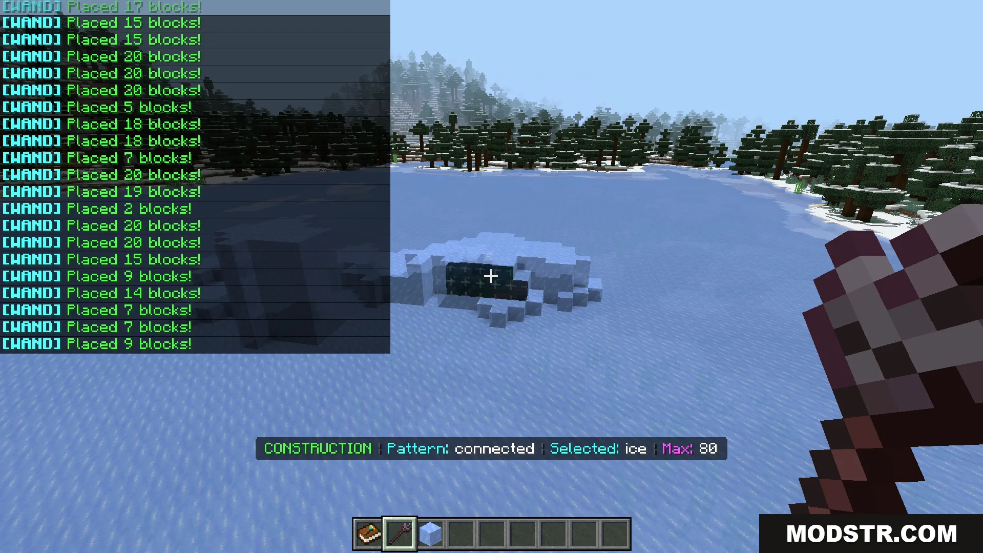 Construction Wands Addon Screenshot 7 Player using construction wand to place connected ice blocks on frozen lake
