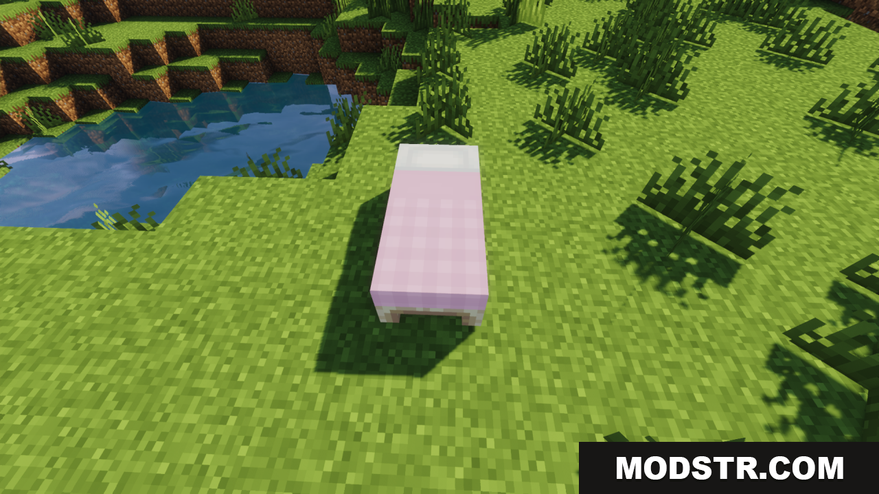 Cozy Nook Beds Resource Pack Screenshot 2 A single pink plaid bed placed on grass near water