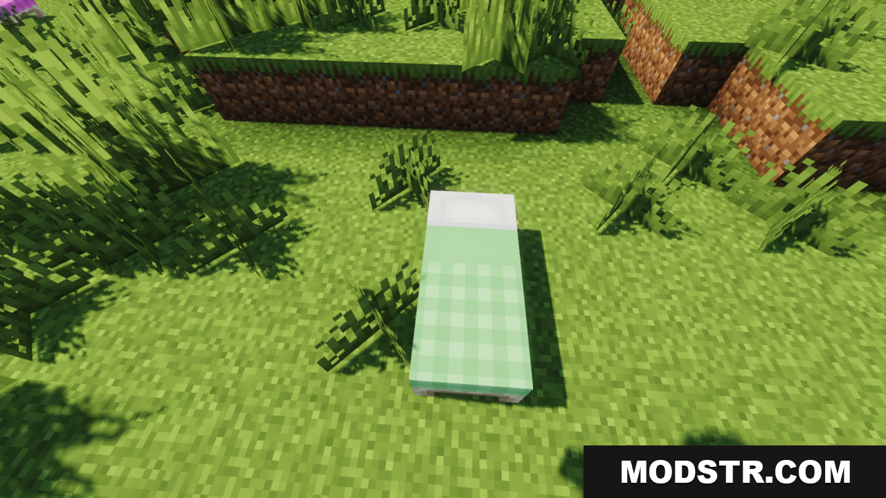 Cozy Nook Beds Resource Pack Screenshot 4 A single Minecraft bed with a green plaid blanket on grass