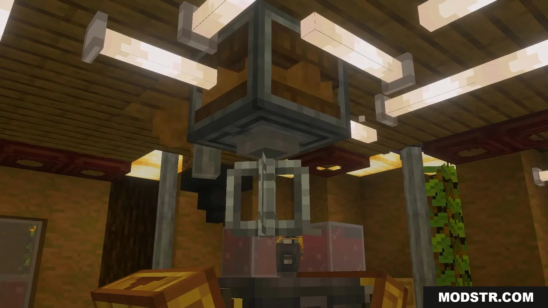 Mechanical mixer machine hanging from the ceiling above a crafting basin