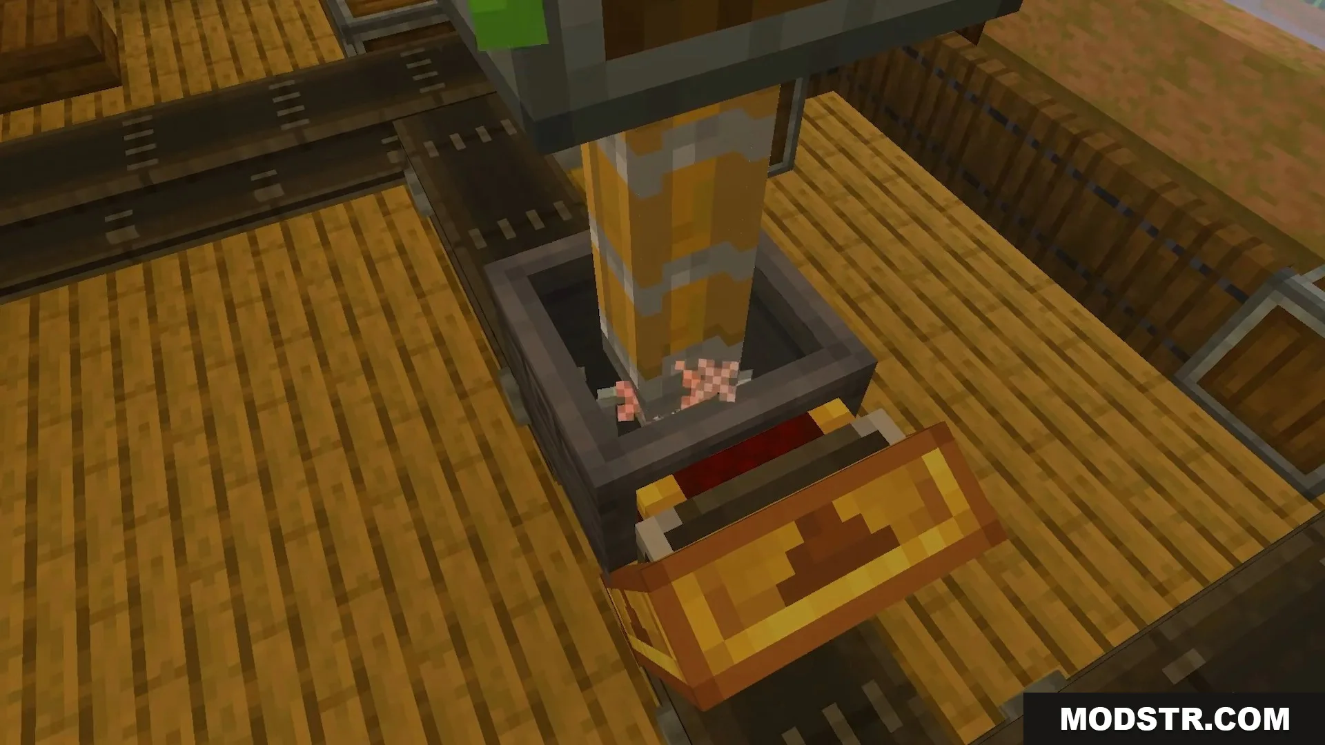 Mechanical press crushing items in a basin on a conveyor belt