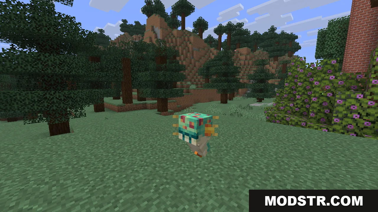A brightly colored ocean creeper with a turquoise and coral patterned body walking across a grassy clearing