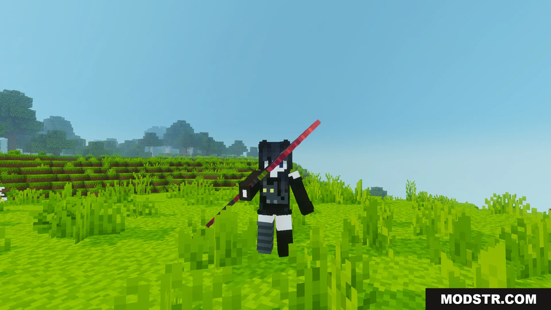 Player holding a long red spear in a grassy field