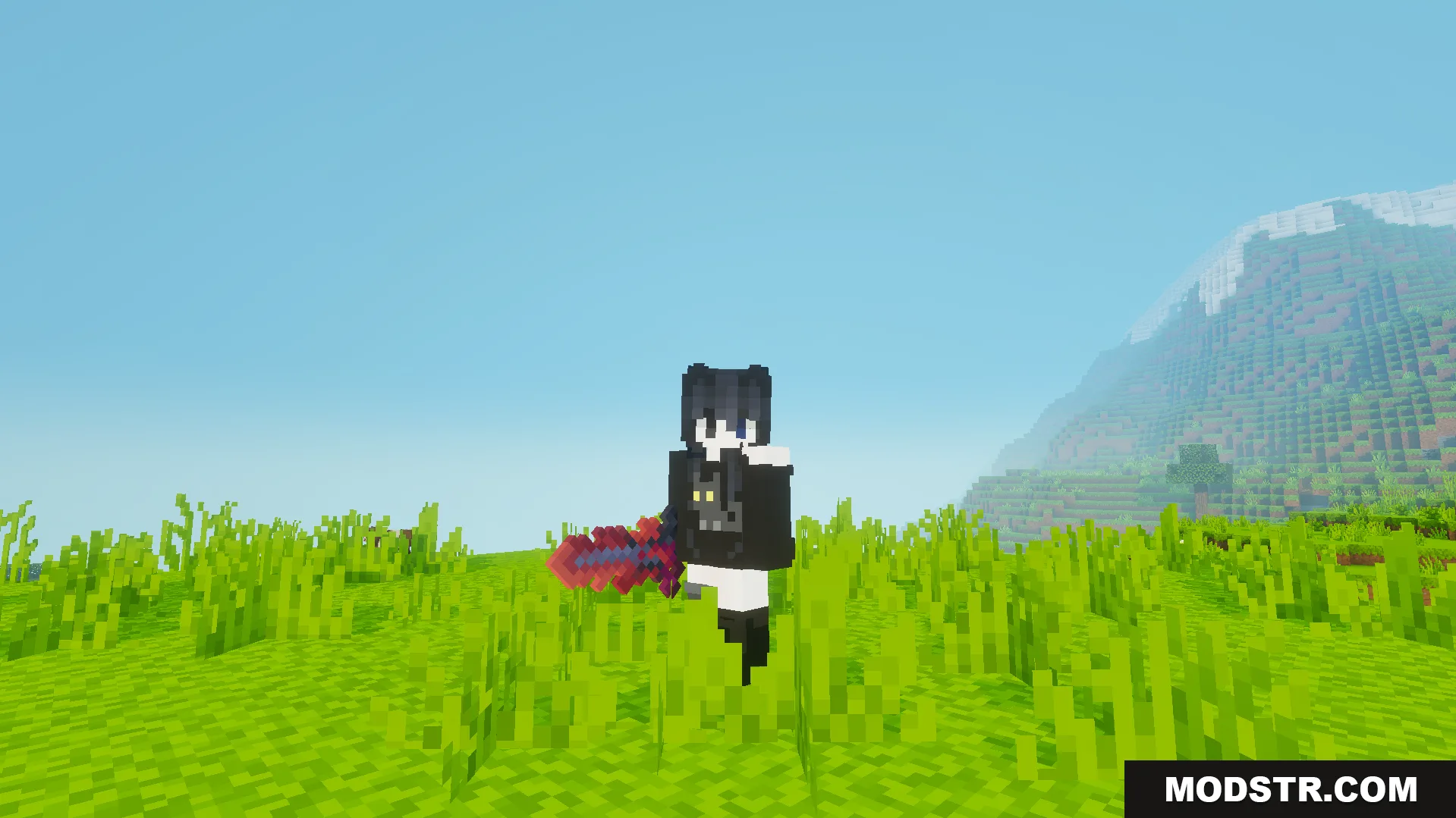 Player character standing in tall grass holding a red and purple custom sword