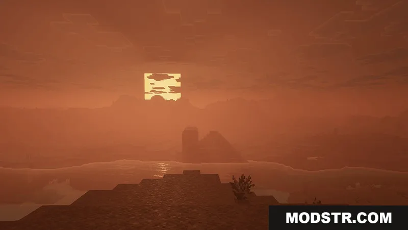 Dusty orange sunset over a desert landscape with a bright square sun