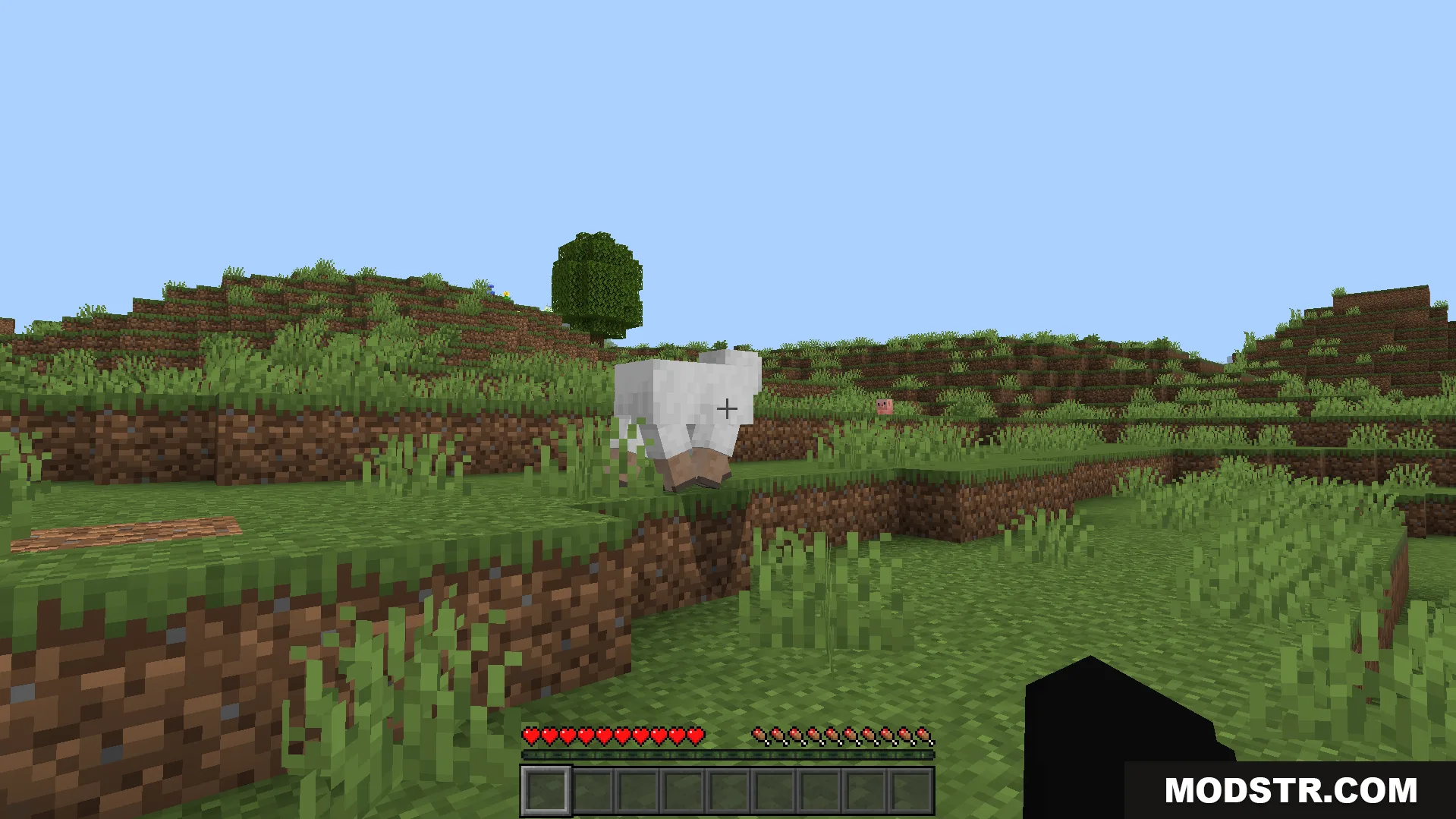 Dark Theme Texture Pack Screenshot 5 A white sheep stands on a grassy hill in a Minecraft world