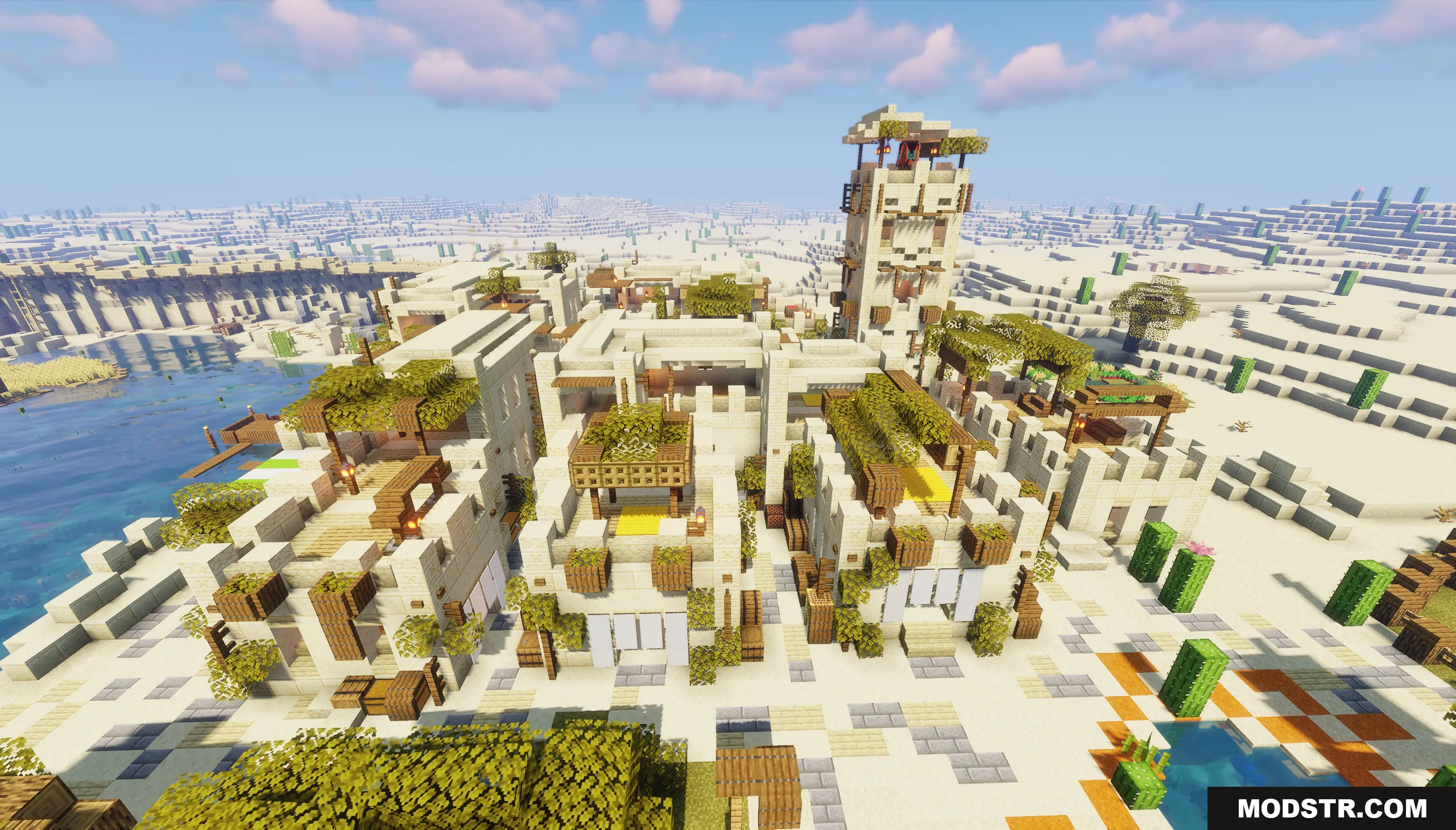 A large desert city featuring sandstone buildings and a tall watchtower