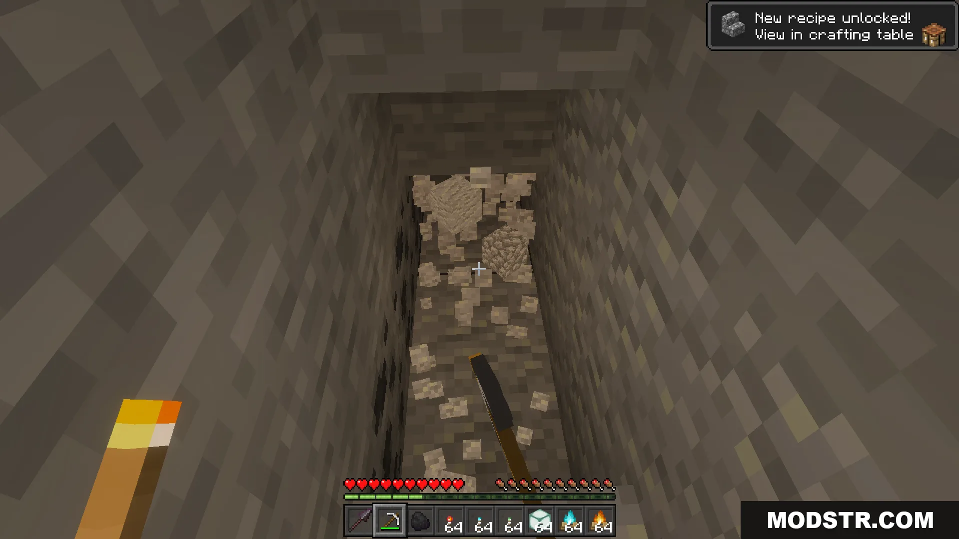 Dynamic Lighting and Offhand Addon Screenshot 5 Player using Dynamic Lighting And Offhand Addon to hold a torch while mining coal