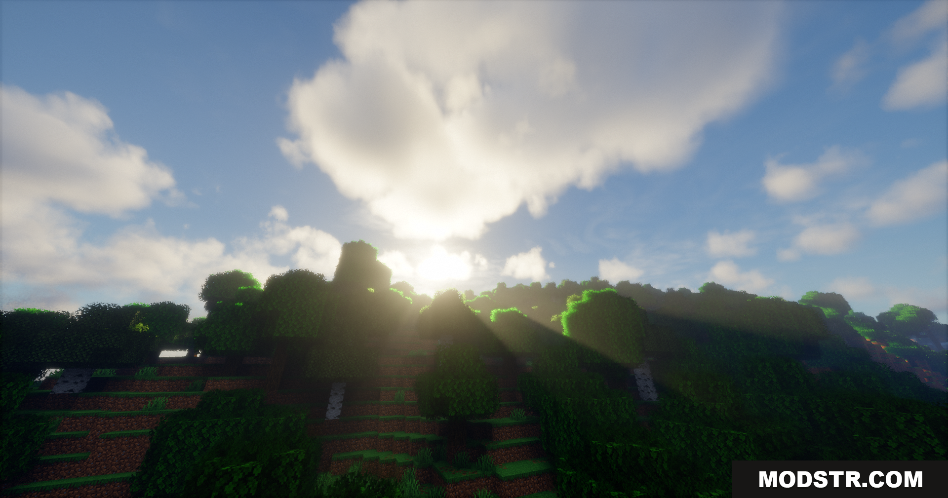 Emanrux Shaders Screenshot 8 Bright sunbeams shining over a forested hill under a cloudy sky