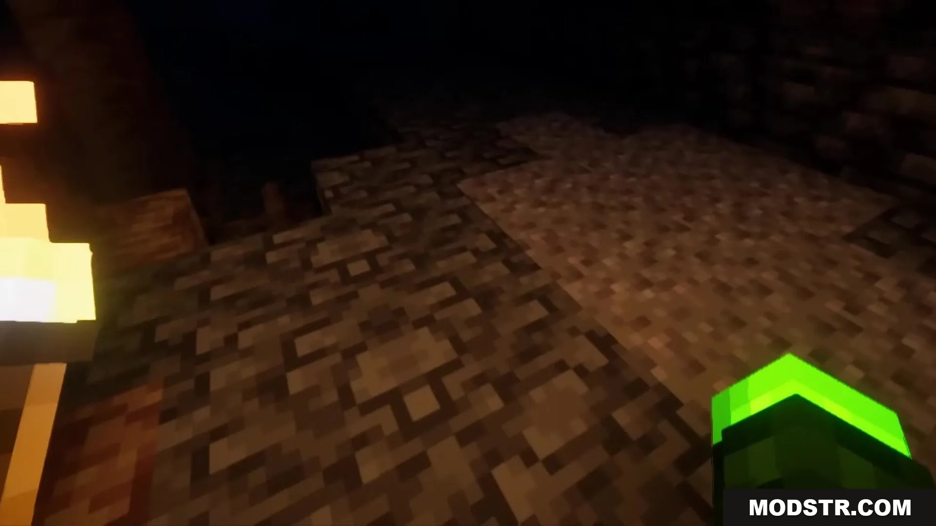 Enhanced Audio Ambience Sound Pack Resource Pack Screenshot 7 A player with a green arm explores a dark cave with a torch