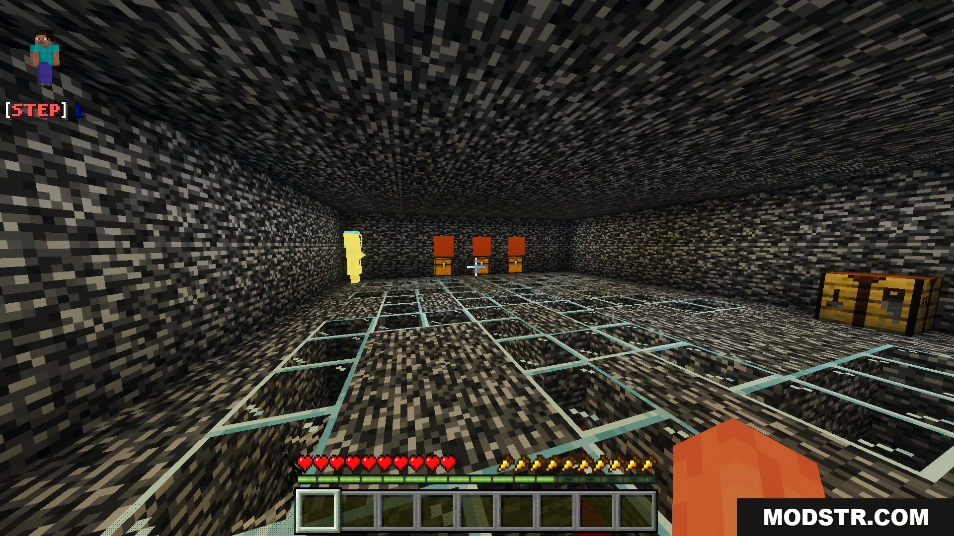 A large bedrock room featuring glass floor tiles and several wooden chests