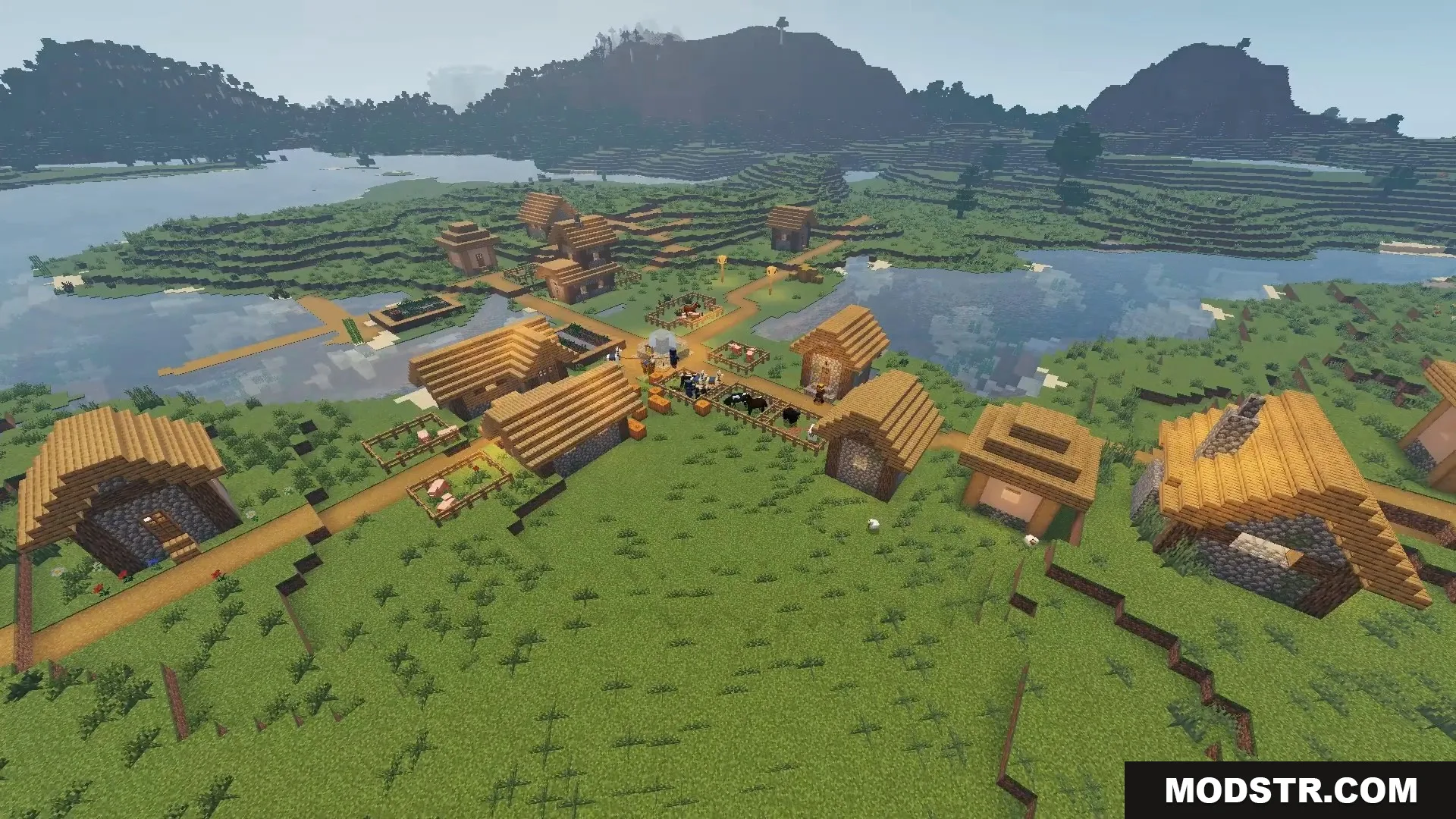 FirmamentCraft 5.0 Shader Screenshot 2 Aerial view of a Minecraft village located near a river with realistic lighting