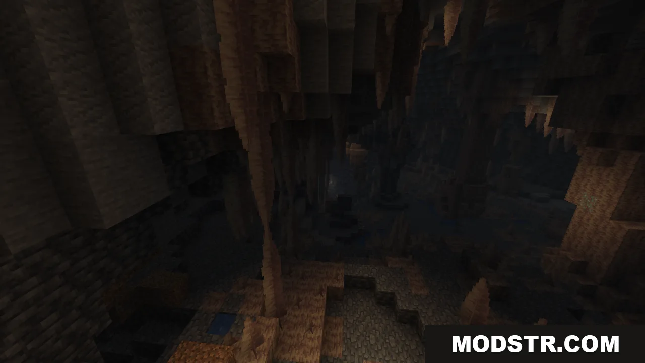 A dark cavern filled with stalactites and stalagmites in the Minecraft world