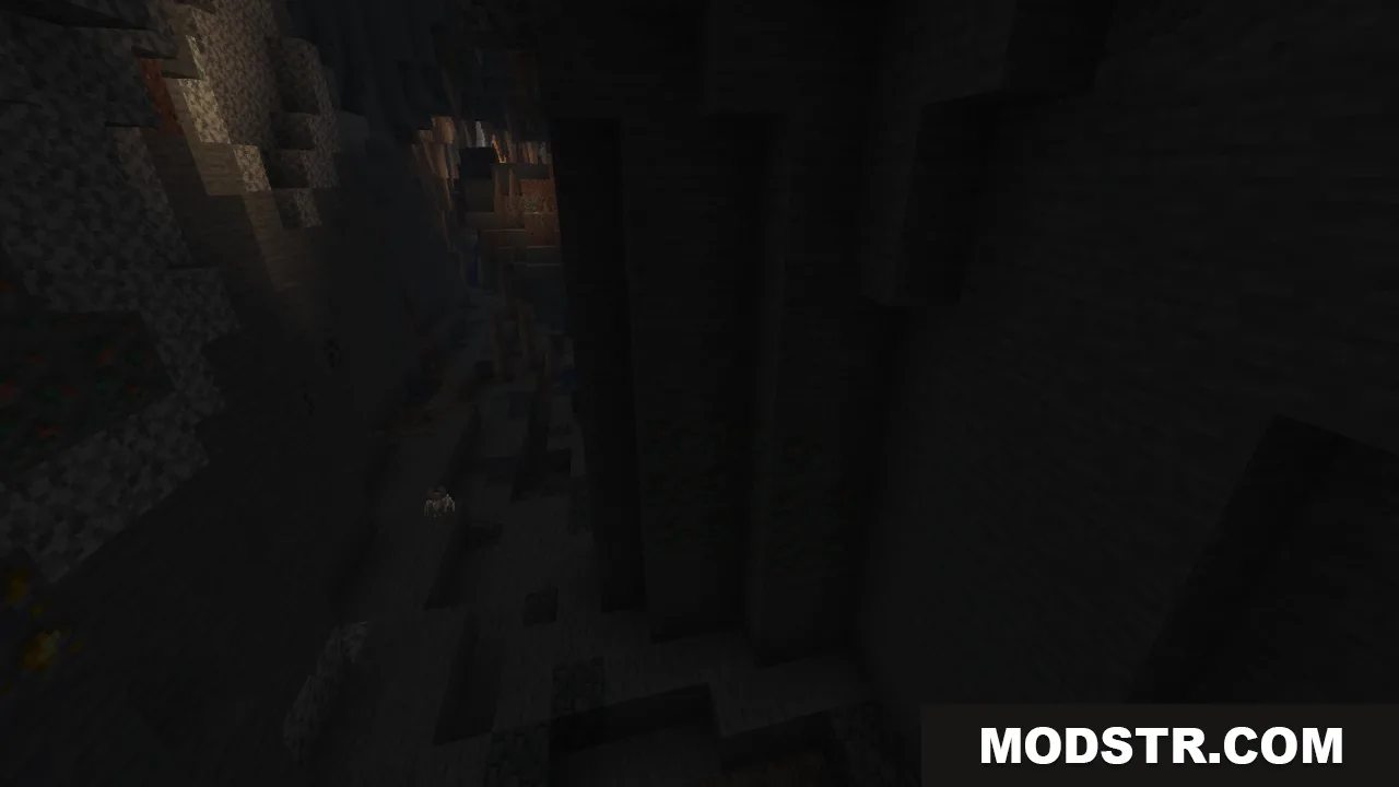 A dark and deep underground ravine with steep stone walls