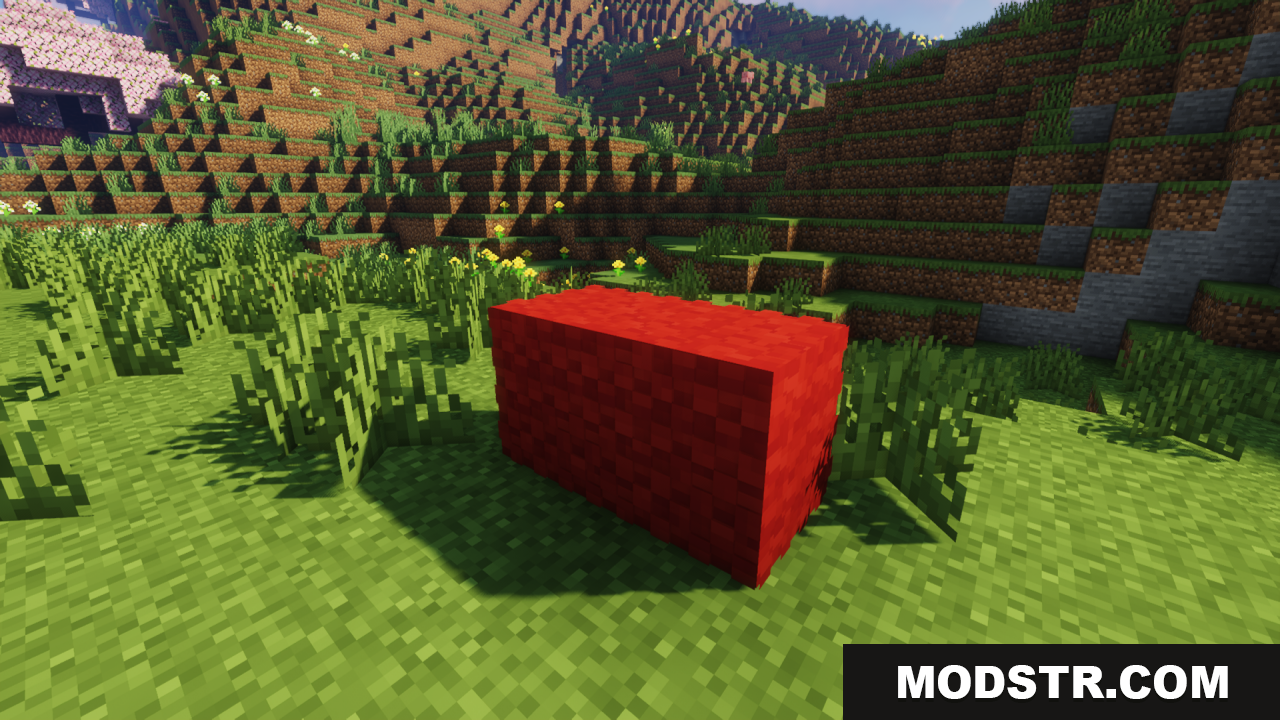 Fluffy Carpets Texture Pack Screenshot 16 A red fluffy carpet block placed in a grassy field