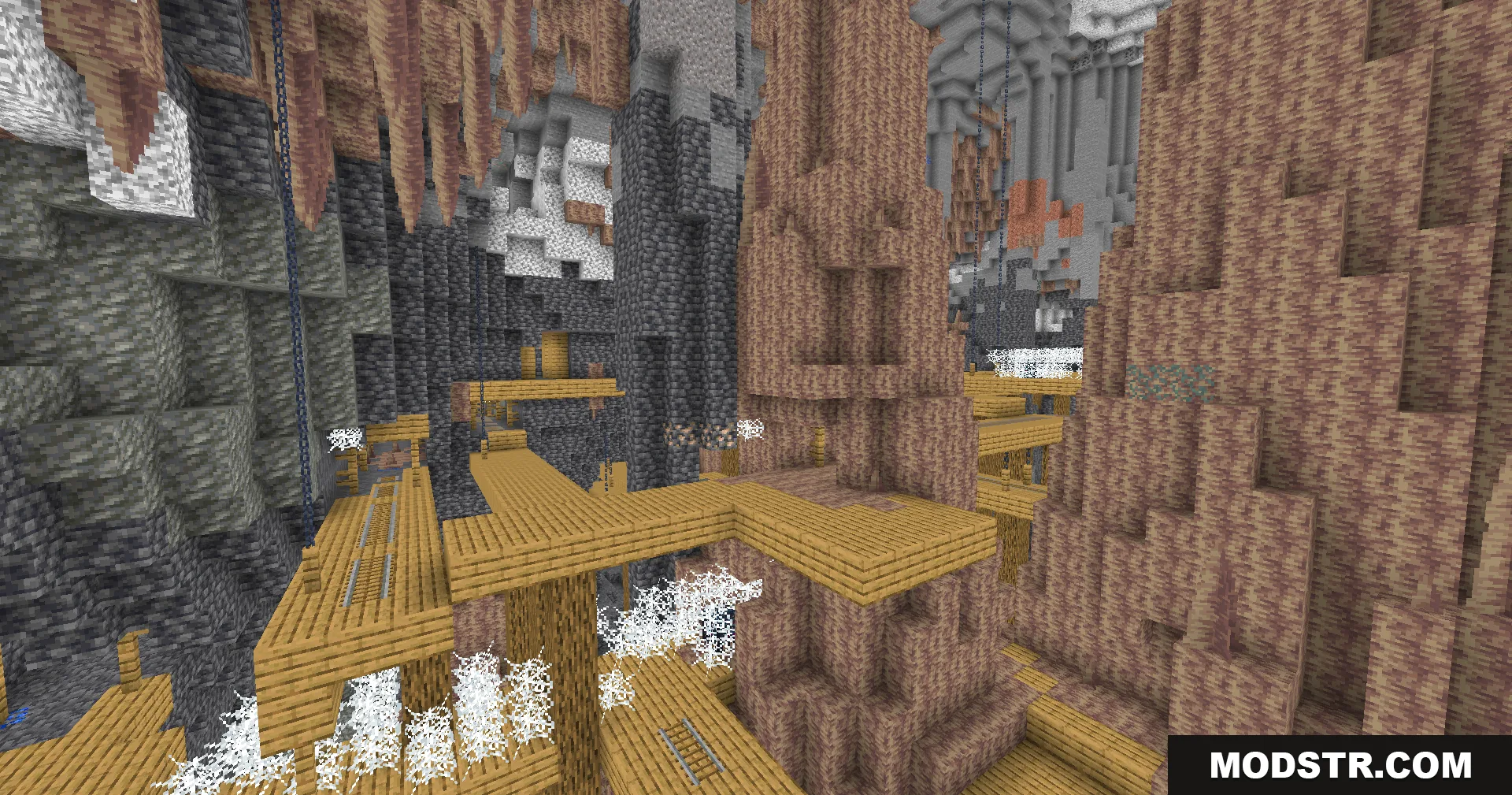 Fullbright Plus Shaders Screenshot 9 Bright underground mineshaft with wooden bridges and dripstone formations in a large cave