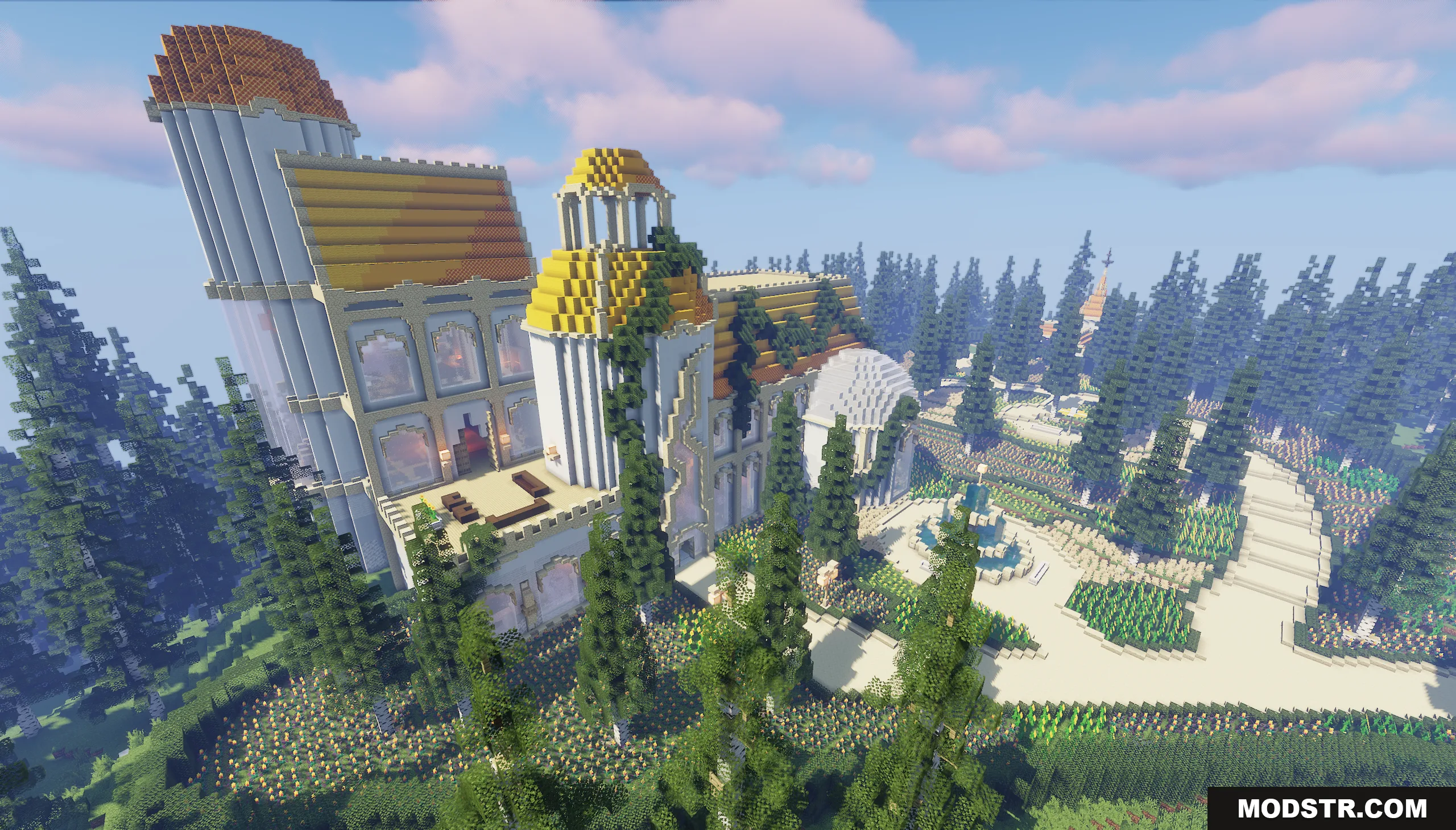 Birds eye view of the grand estate with winding paths and vibrant flower gardens