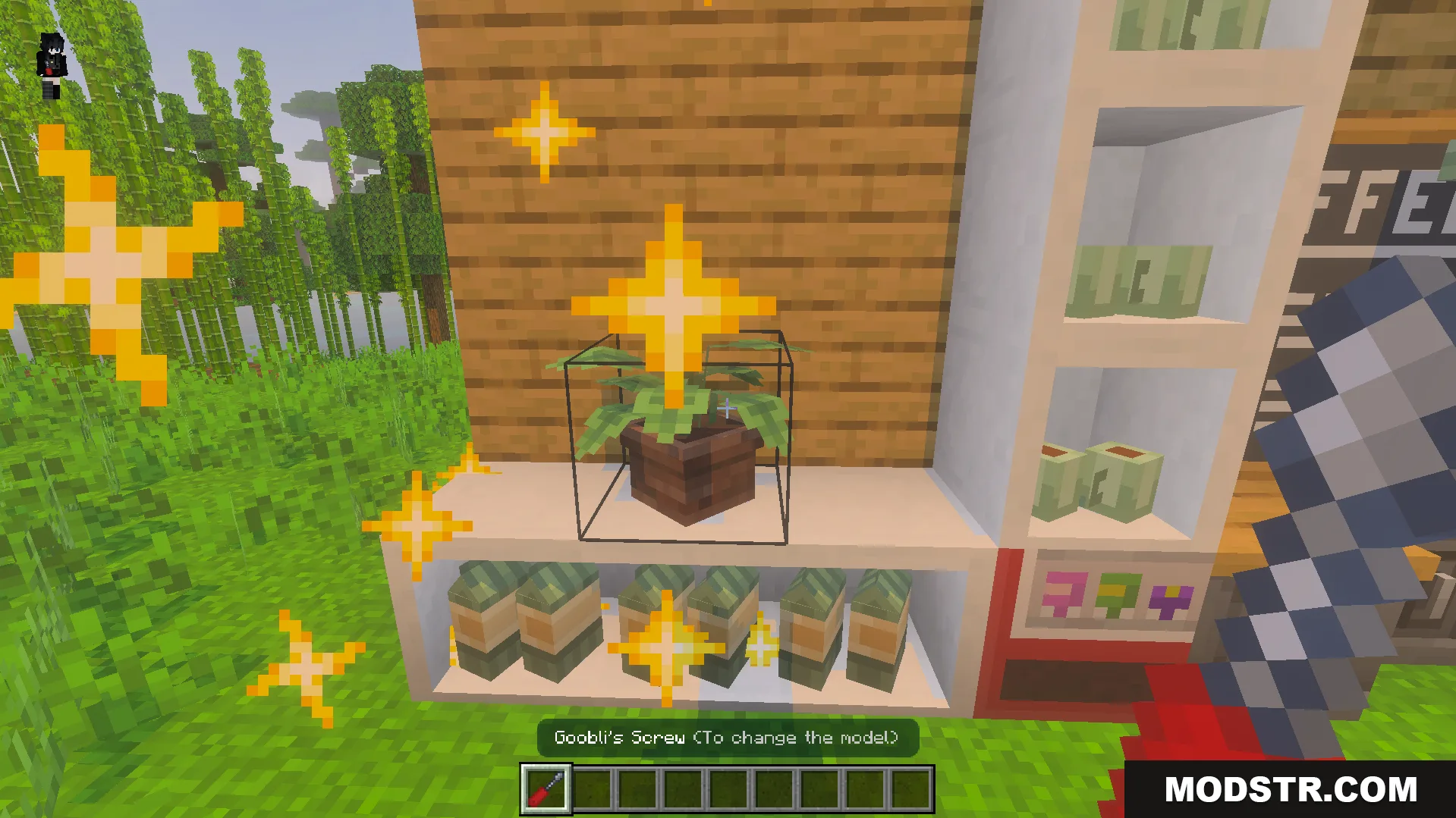 Gooblideco MCPE/Bedrock Mods & Addon Screenshot 6 Player holding a screwdriver tool near a potted plant