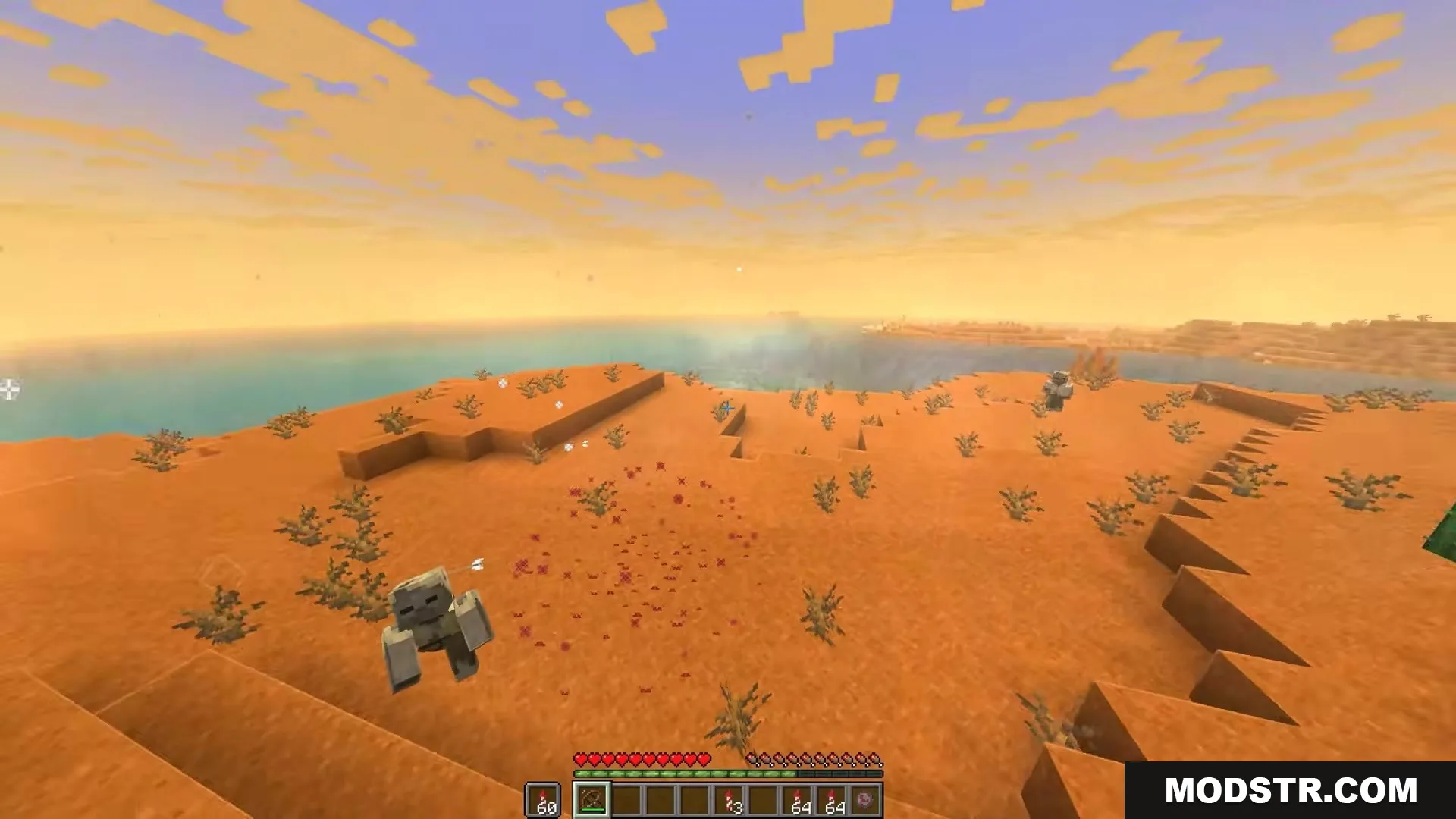 Red particles from a firework explosion appear near a desert Husk